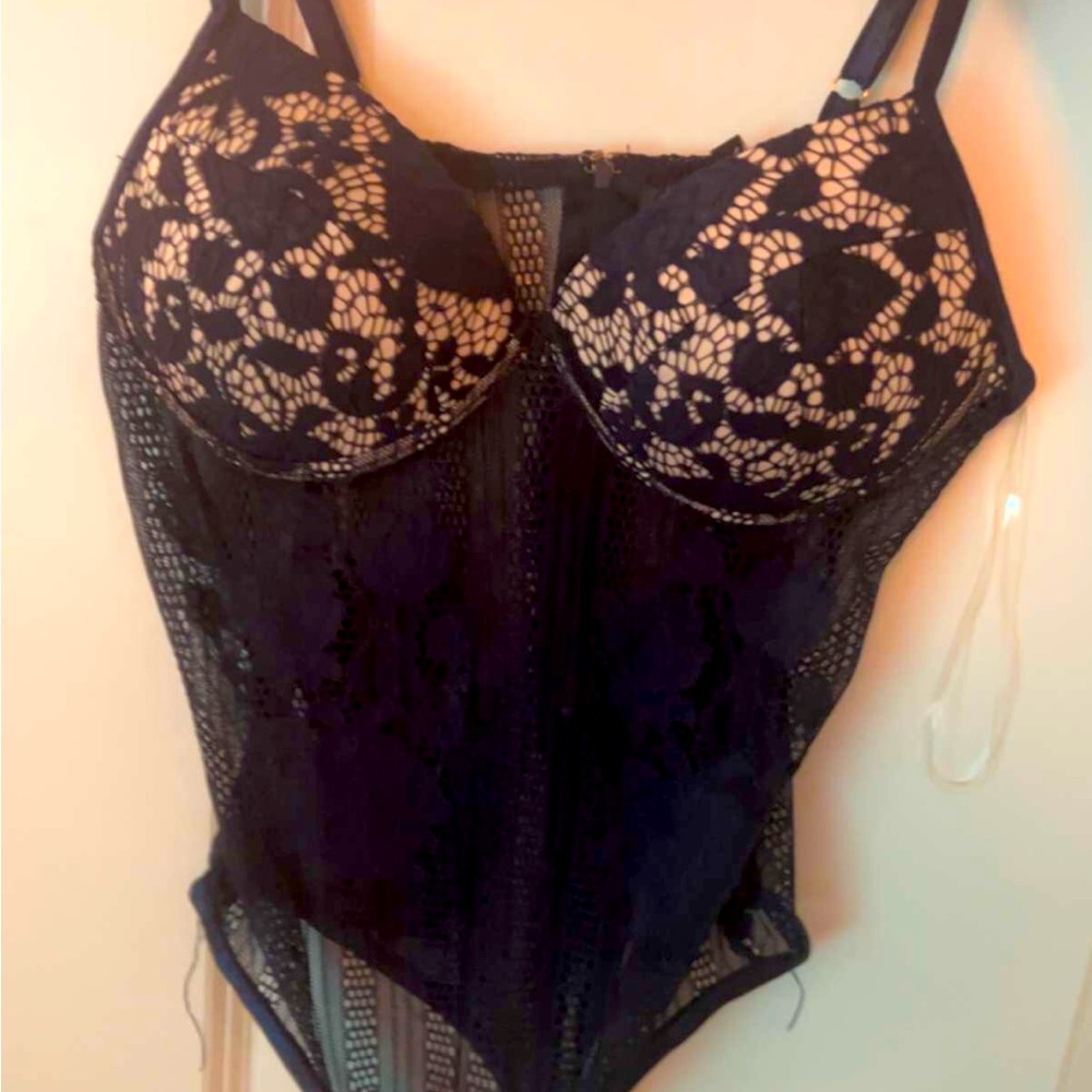 A dark blue lace bodysuit